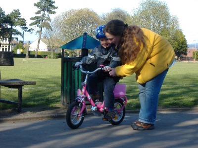 Getting the hang of pedalling on a slightly smaller bike.