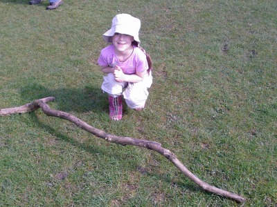 Little girl, big stick